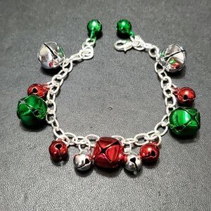 Silver tone holiday bells charm bracelet up to 7.25" red green